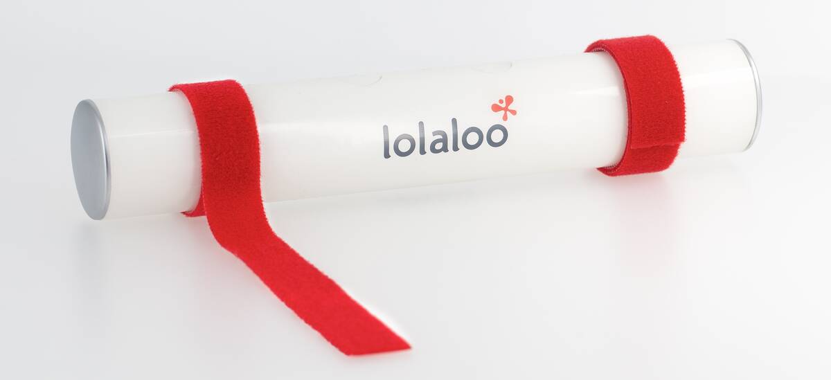 Two Red Velcro Straps Are Firmly Attached to the lolaloo Sleeping Aid.